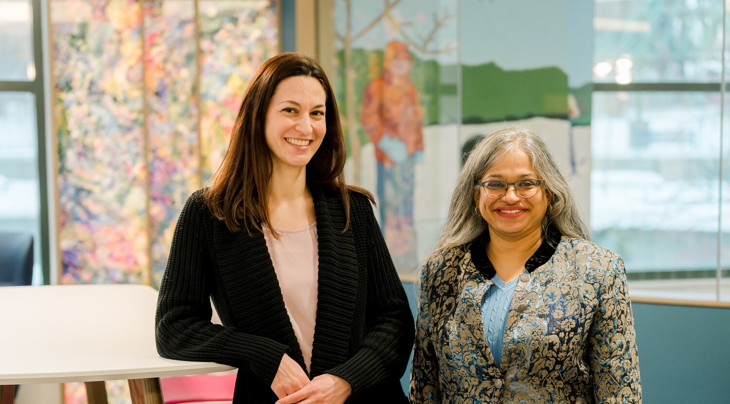 a portrait photo of Christine Conelea, Ph.D., and Suma Jacob, M.D., Ph.D.