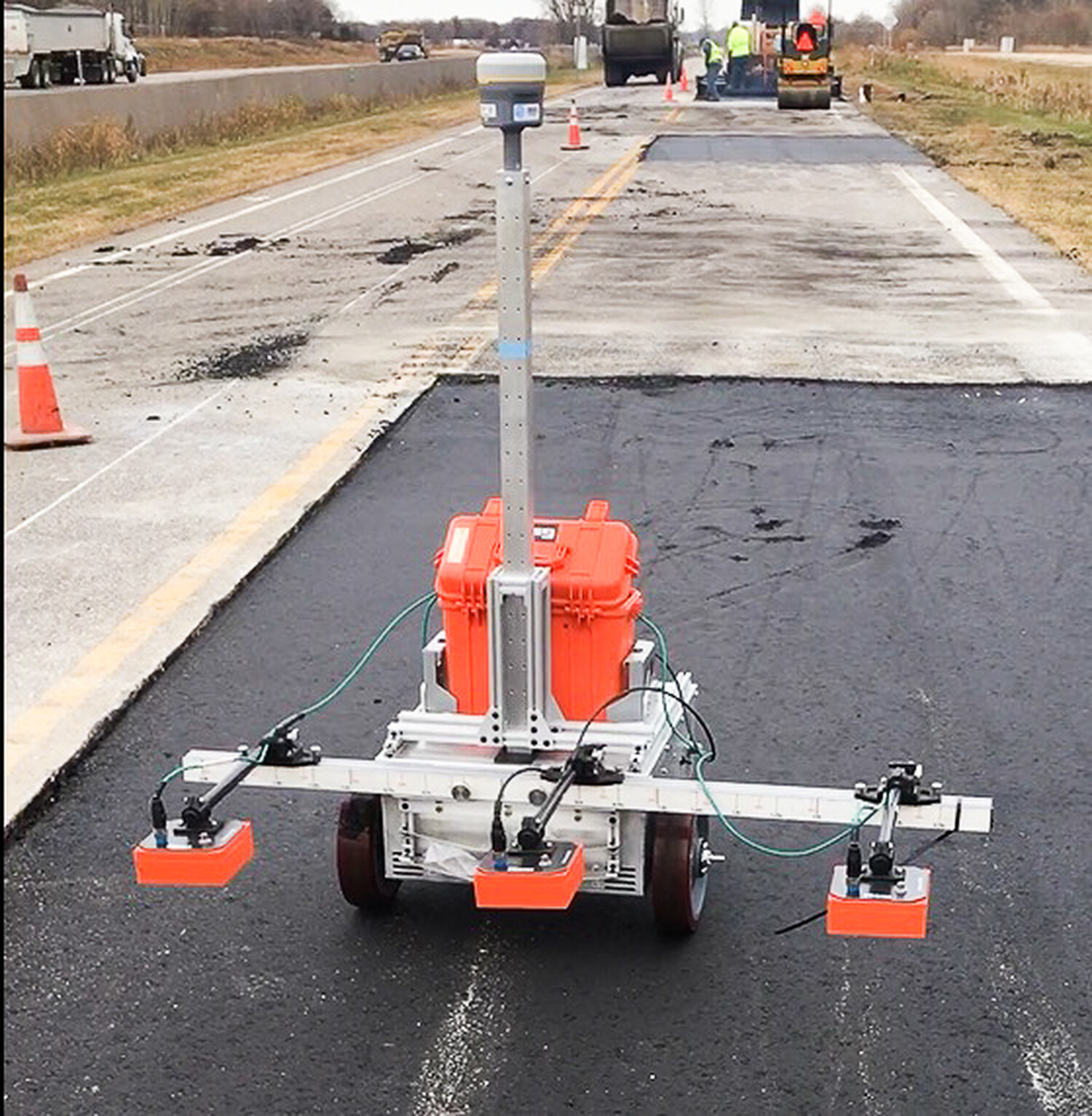 College of Science and Engineering robot measures the density of asphalt