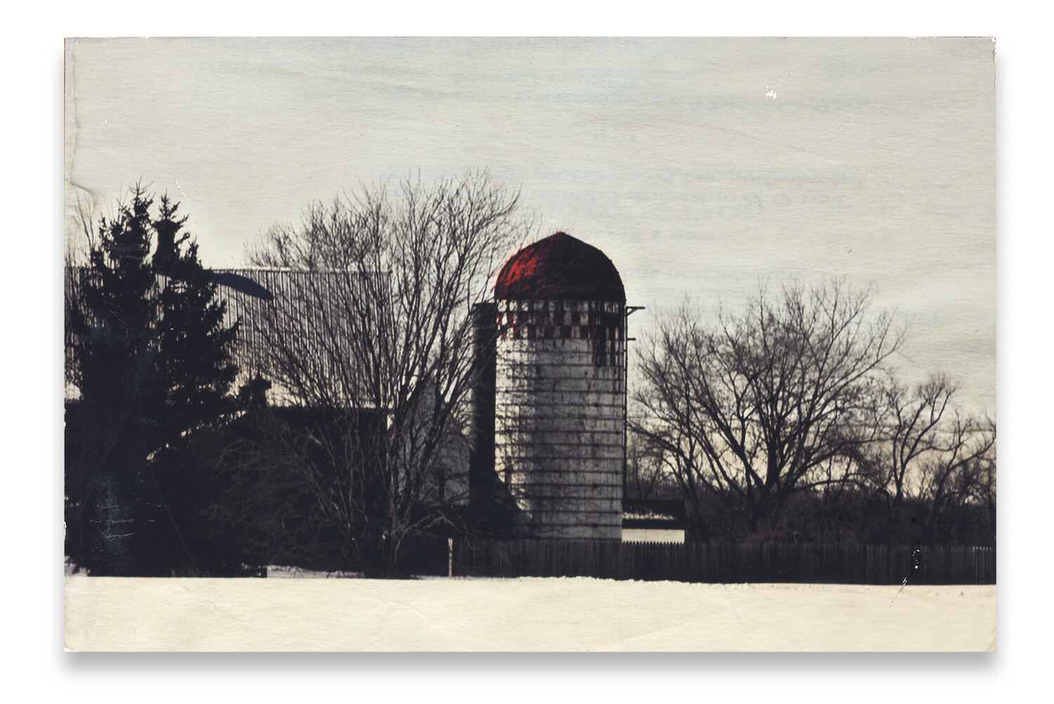 photo of Cold Morning, a photograph showing a bold red silo roof on an otherwise black-and-white farm scene