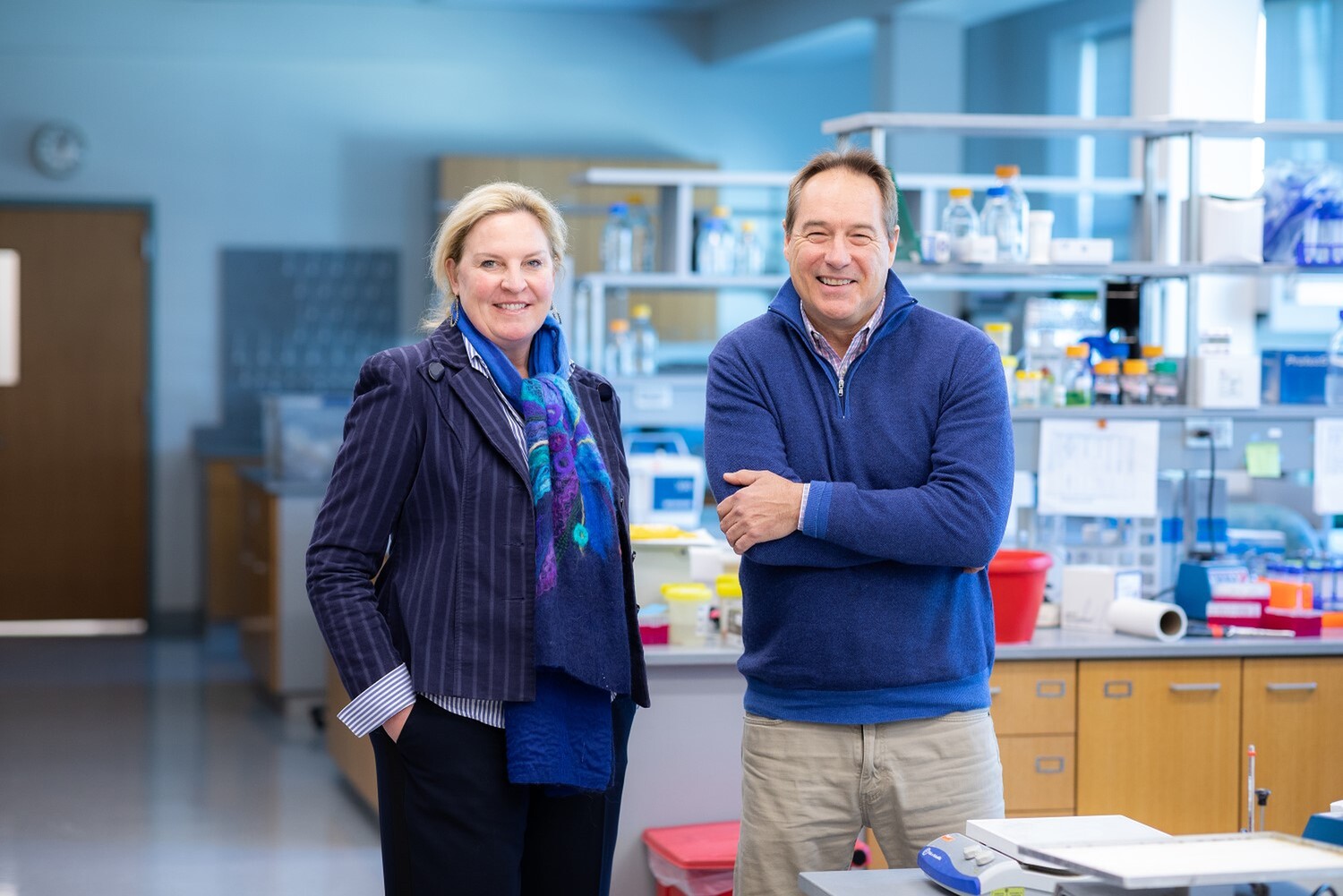 Laura Niedernhofer, M.D., Ph.D., and Paul Robbins, Ph.D., stand in their research lab