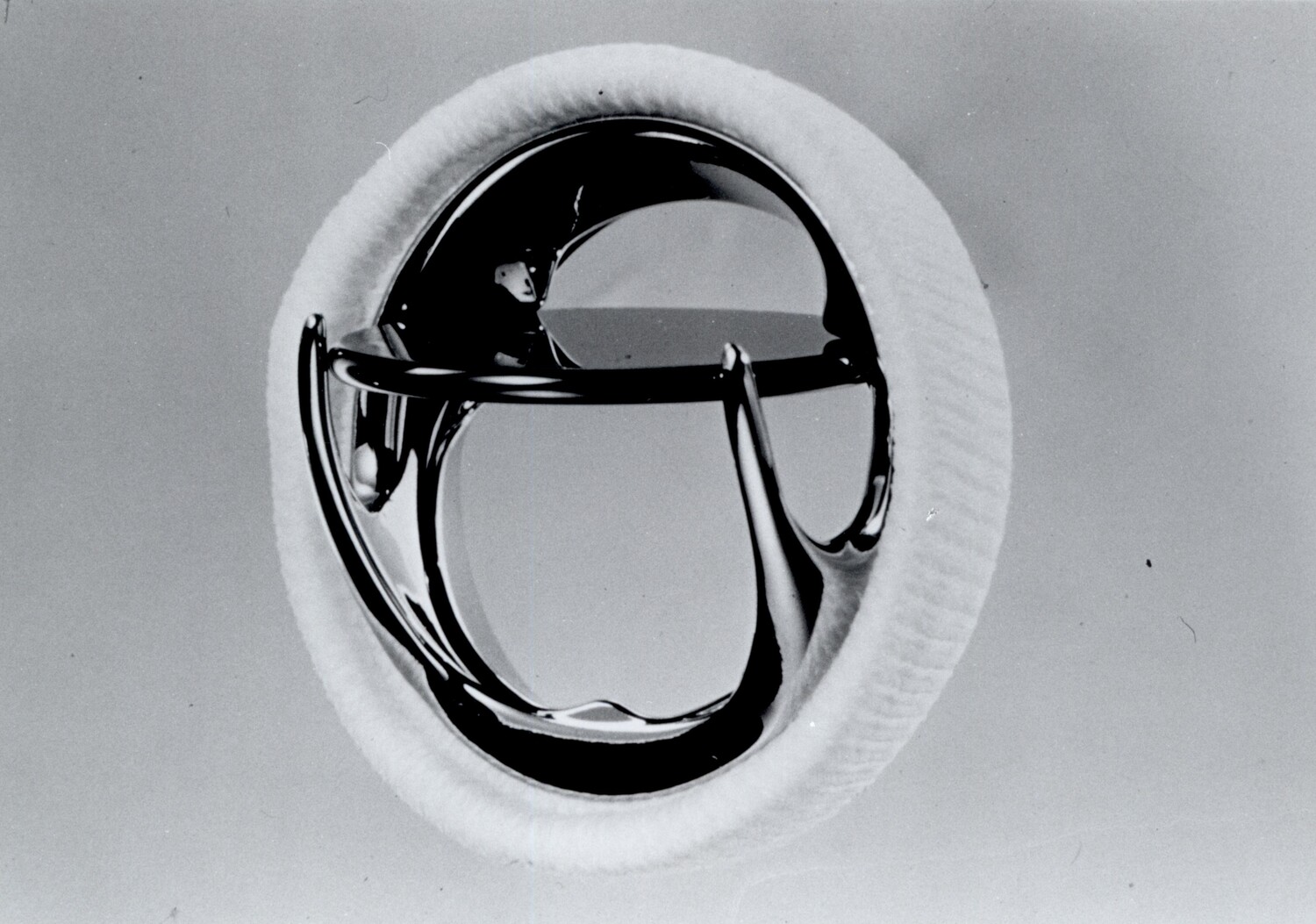An archival photo of a mechanical heart valve
